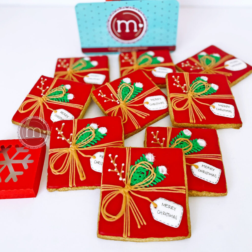 Galletas decoradass para regalos para clientes en temporada de navidad. Galletas rojas personalizadas para navidad.